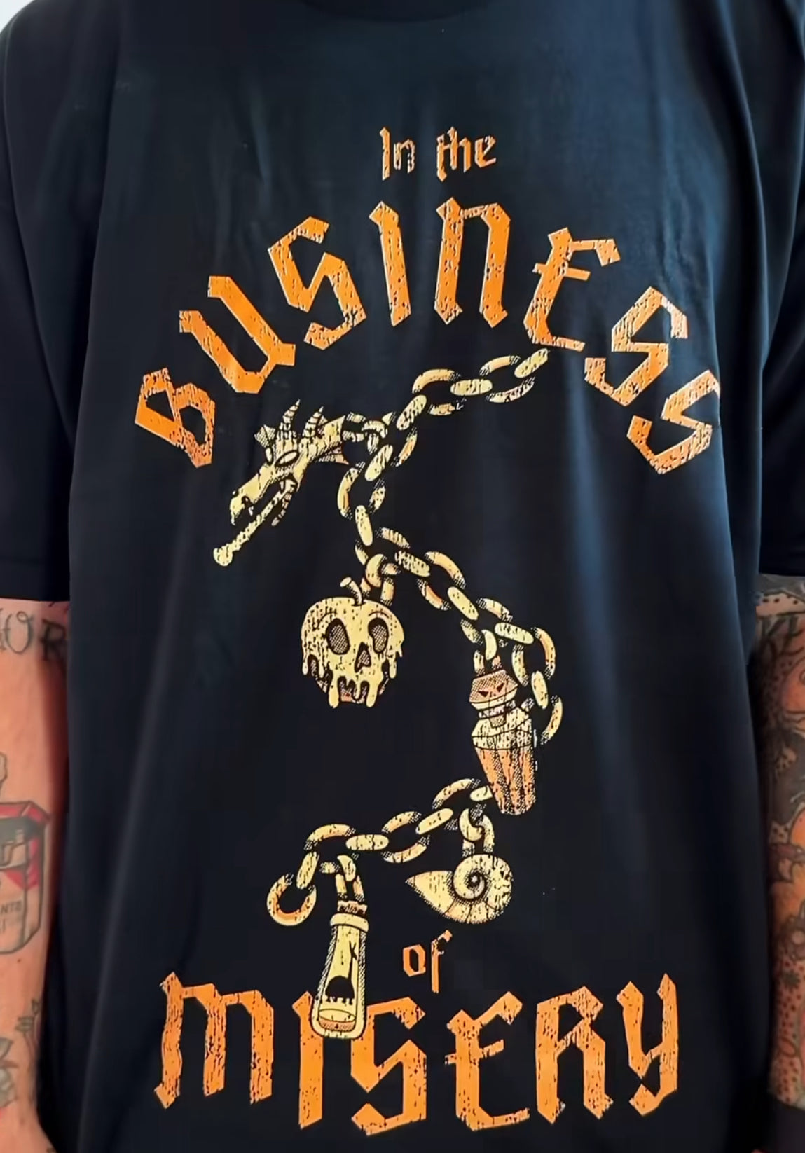 In the Business of Misery Tee