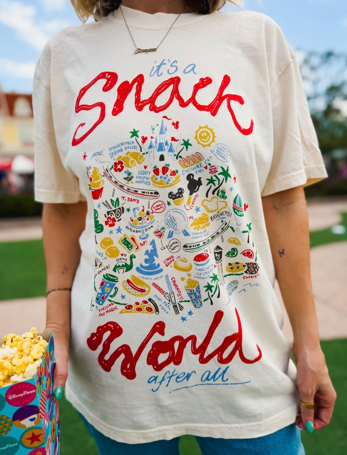 It’s A Snack World After All Tee